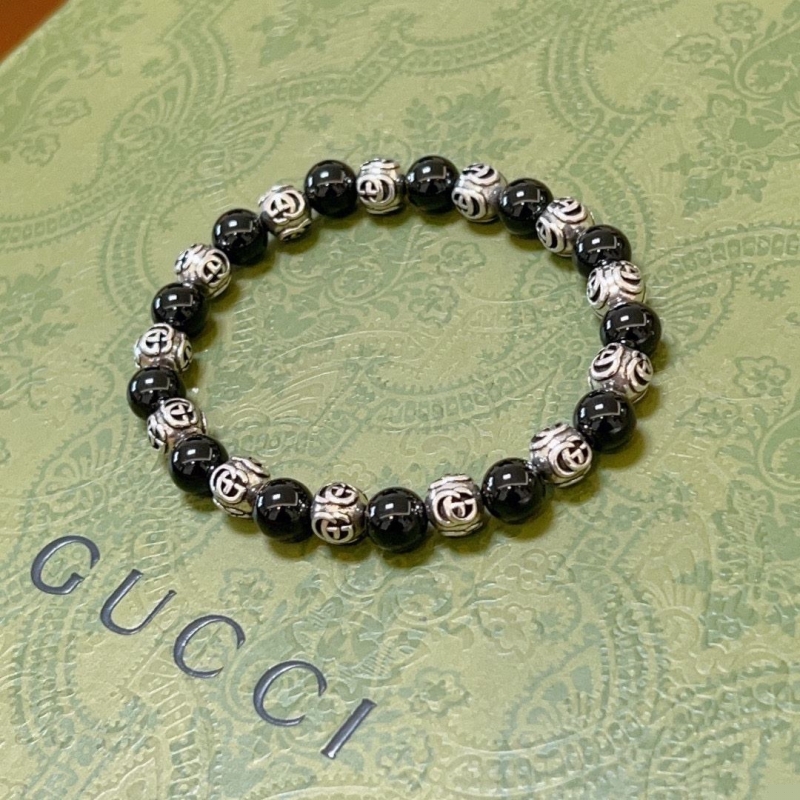 G*u*i bracelets